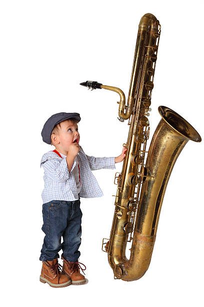 istock Saxophone and Little Boy 185273859