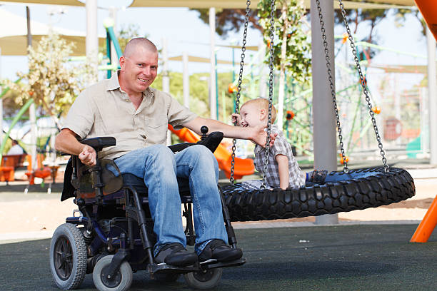 istock Dad play with son outdoor at park 185273909