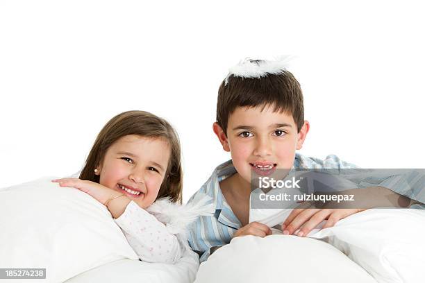 Pillow Fight With White Feathers Stock Photo - Download Image Now - 4-5 Years, 6-7 Years, 8-9 Years