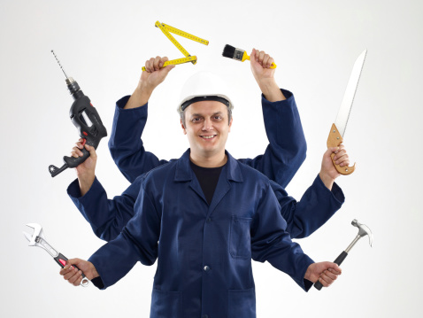 Handyman with six arms holding assorted tools.
