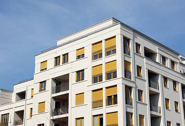 istock Modern apartment house with yellow jalousies 185274996