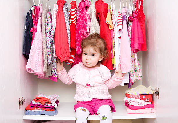 istock Baby girl choosing her clothes 185275062