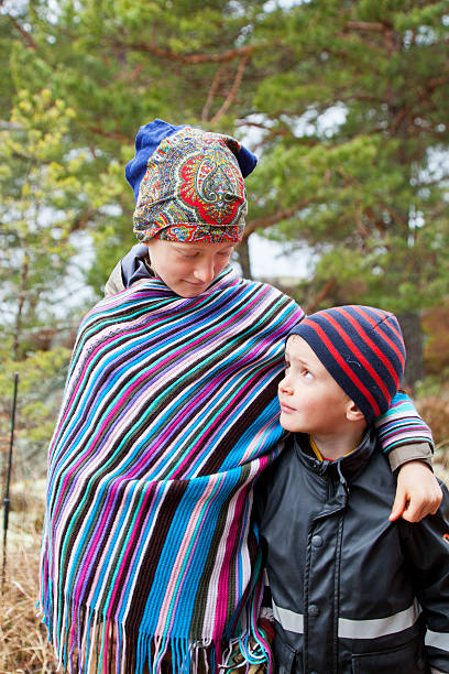 istock Big brother looking after his younger sibling. 185275224