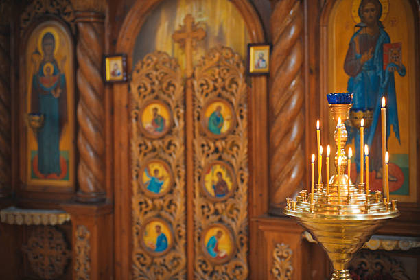 istock Burning candles in ortodox church 185275329