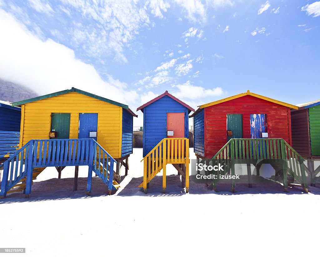 Beach Huts Brightly painted beach huts in Muizenberg Cape Town, South Africa Changing Cubicle Stock Photo