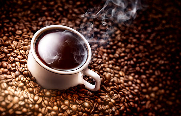 コーヒーカップのクローズアップ。 - coffee cup coffee cup coffee bean ストックフォトと画像