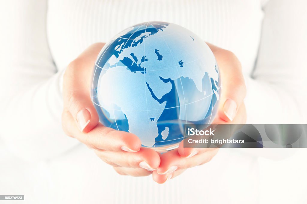 Blue globe in cupped hands Similar images: Glass - Material Stock Photo