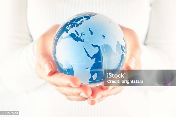 Blue Globe In Cupped Hands Stock Photo - Download Image Now - Glass - Material, Globe - Navigational Equipment, Adult