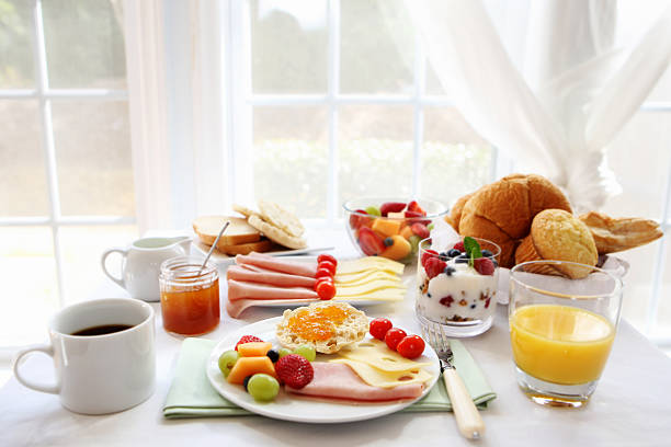 Full breakfast on a sunny day  breakfast table continental breakfast stock pictures, royalty-free photos & images