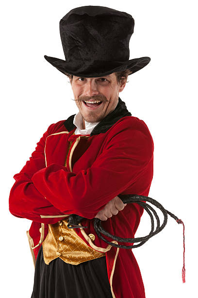 istock Happy circus ring master standing with arms crossed 185277522
