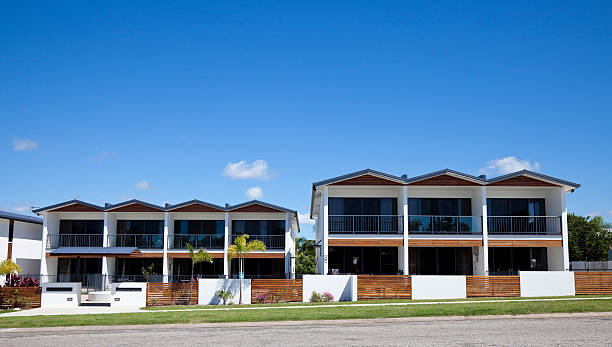 istock Urban Apartment Building with clear blue sky 185277839