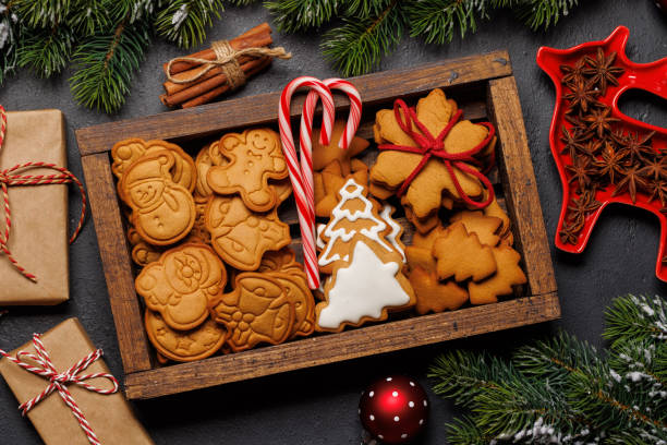 istock Gingerbread cookies and fir tree branch 1852782161