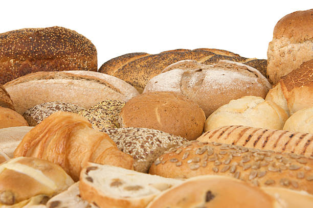 istock Different types of fresh breads and rolls on white background 185278690