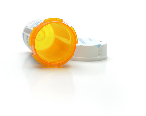 empty prescription medicine bottle - pillenpotje stockfoto's en -beelden