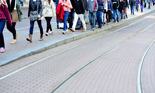 istock People walking on street 185278777