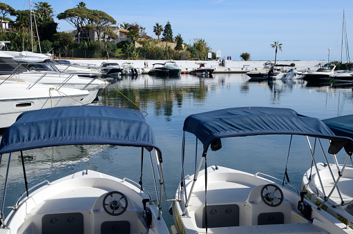 Marbella, Spain - December 8, 2023: Boats in Cape Pine Port of Marbella, a city in Malaga province, Andalusia, Spain.