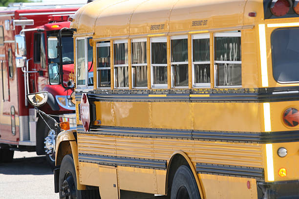 Close ups of yellow school bus on field trip.
