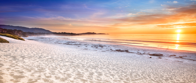 Sand beach panorama by the Pacific Ocean coastline in Carmel California near Monterey