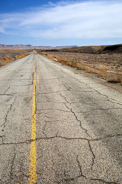 istock desert badlands road trip landscape 185279678
