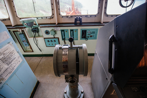 A Canadian Navy ship is docked for repairs/maintenance.