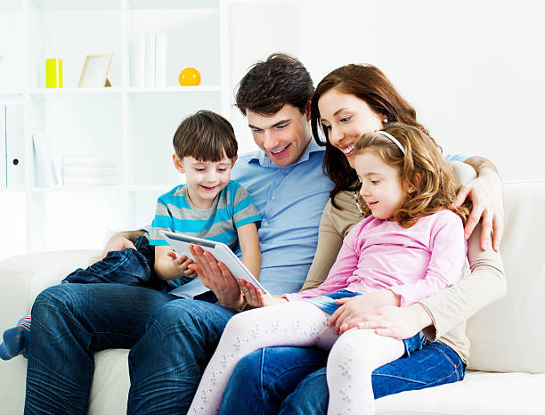 istock Family Having Fun with a digital tablet. 185280579