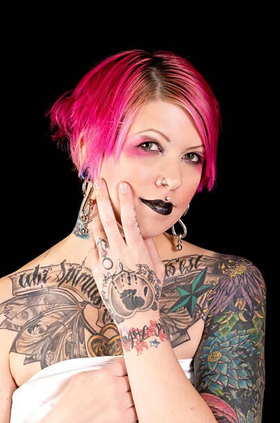 istock Tattooed woman showing hand. 185280923