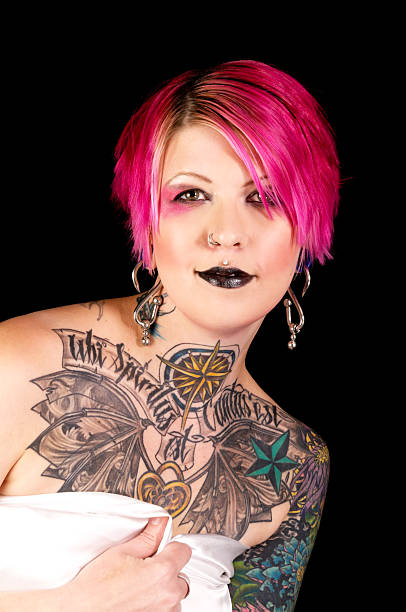 istock Smiling pink haired woman with tattoos. 185280929