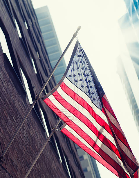 istock USA flag on Manhattan skyscraper 185281452