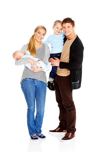 Beautiful family - Father mother with two kids standing over white background