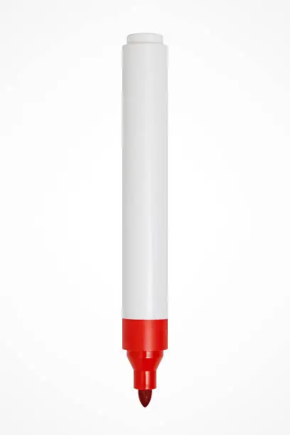 Photo of Red felt tip pen on white background