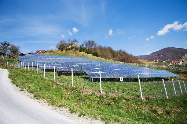 istock Hill on a country side with solar panels 185282241