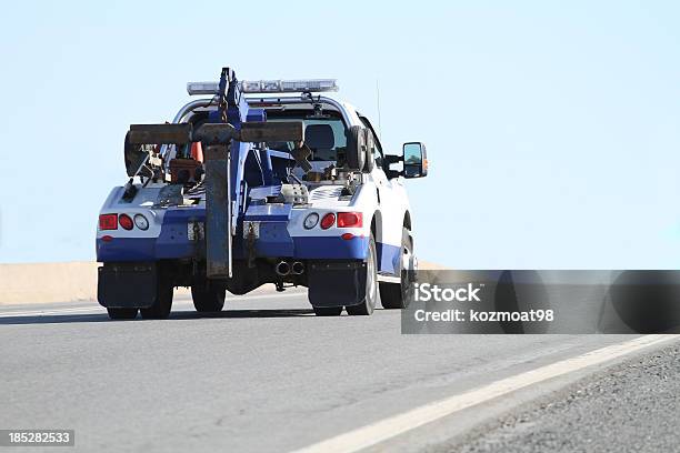 Tow Truck Stock Photo - Download Image Now - Tow Truck, Highway, Rear View