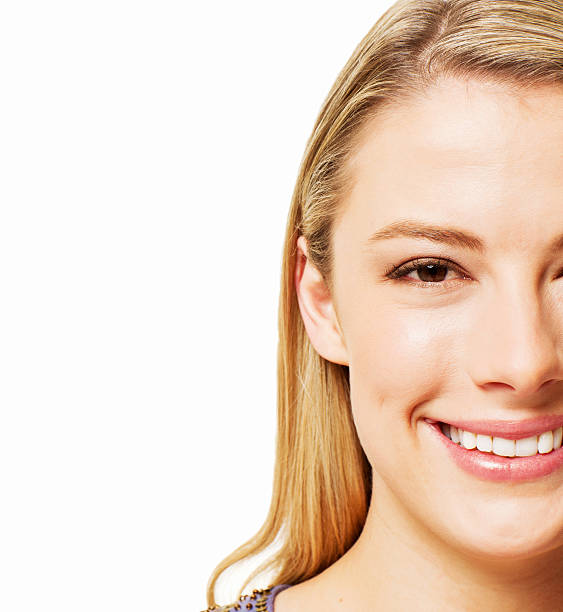 istock Woman Smiling at Camera - Isolated 185282687