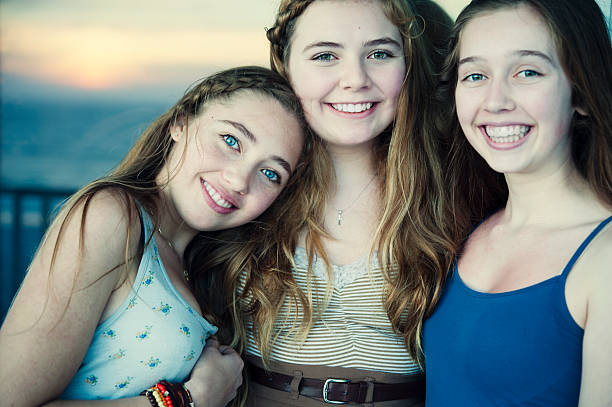istock Three teenage girls at sunset. 185282962
