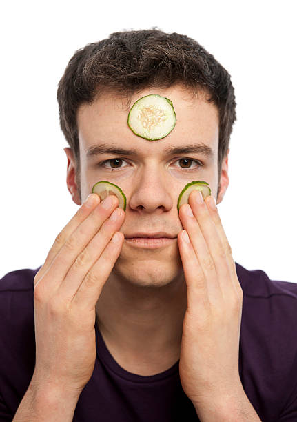 istock Young man with facial mask 185283053