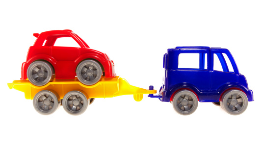 Car on a tow truck on isolated white background