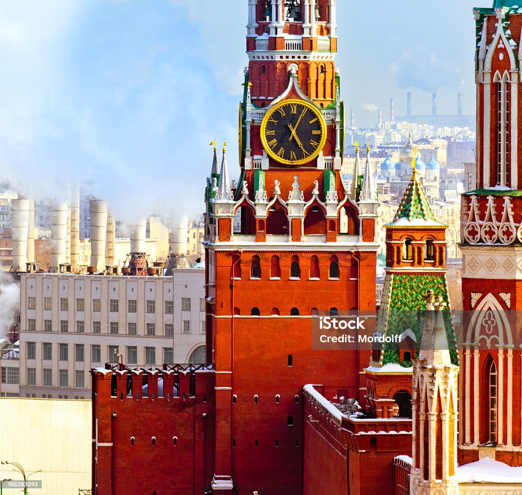 The Spasskaya Tower in Moscow The Spasskaya Tower is the main tower with a through-passage on the eastern wall of the Moscow Kremlin, which overlooks the Red Square. Aerial View Stock Photo
