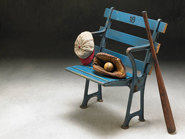 istock Old stadium seat with antique baseball items 185283295