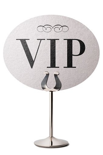 VIP announcement on a silver table stand. Isolated on a pure white background, absolutely no dot in the white area no need to cut-out e.g. can be dropped directly on to a white web page seemlessly.