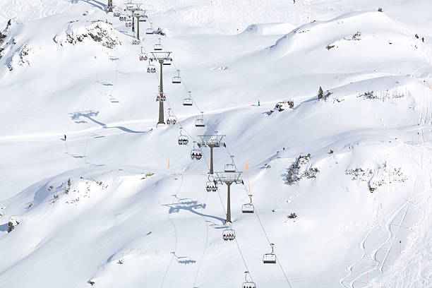 istock chair lift in snowy mountains 185283707