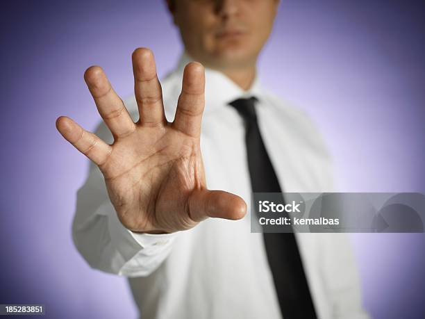 Businessman Touching On Virtual Screen Stock Photo - Download Image Now - Number 5, Men, Stop Gesture