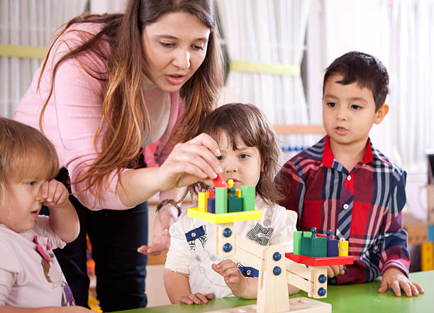 istock Preschoolers and Teacher 185284447