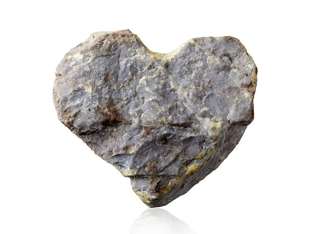 stone heart stone heart#aaon white background hearts made of stone stock pictures, royalty-free photos & images