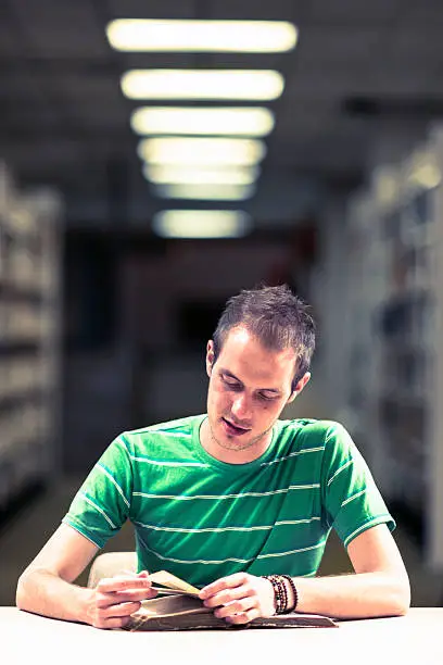 Photo of Male student in library