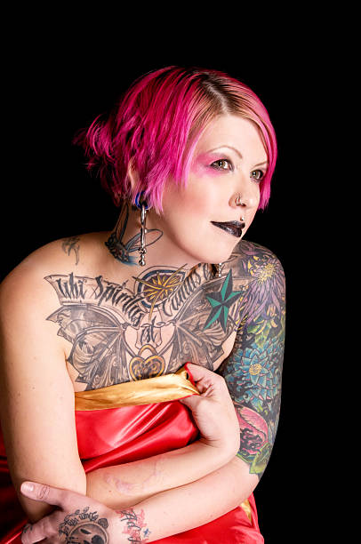 istock Pink haired woman wrapped in red satin. 185285684