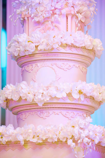 istock Elegant cake for wedding celebration, decorated with various items 1852859132