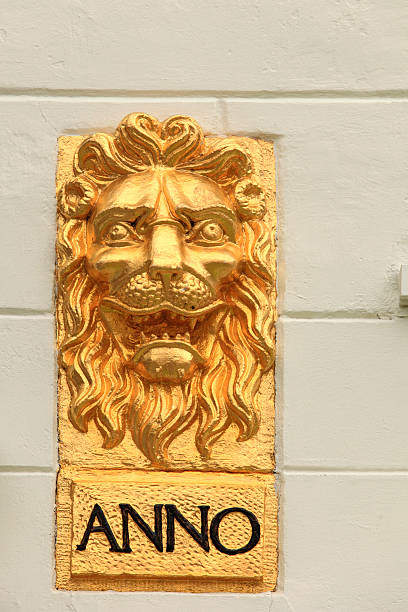 bas relief of a lion with the word anno