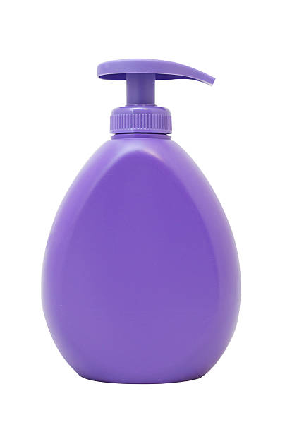 mydło szafarka pojemnika - liquid soap purple isolated cosmetics zdjęcia i obrazy z banku zdjęć