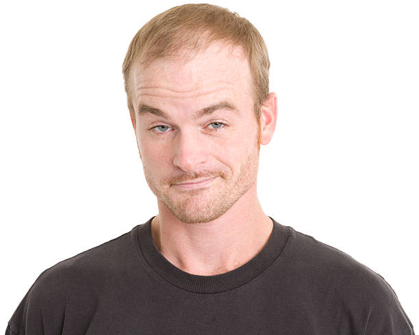 Smug Man Raises Eyebrows Portrait of a man on a white background. http://s3.amazonaws.com/drbimages/m/sk.jpg sneering stock pictures, royalty-free photos & images