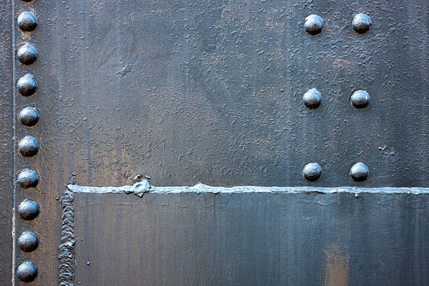 Welded Steel Background with Rivets stock photo